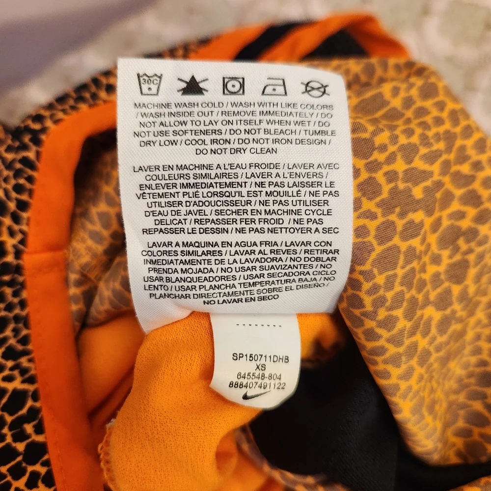 Nike Women's Tempo Dri-FIT Mid Rise Running Shorts Orange Animal Print, Size XS - Picture 8 of 12